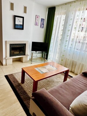 TV, fireplace - Grand Monastery Private Apartments (Smolyan)