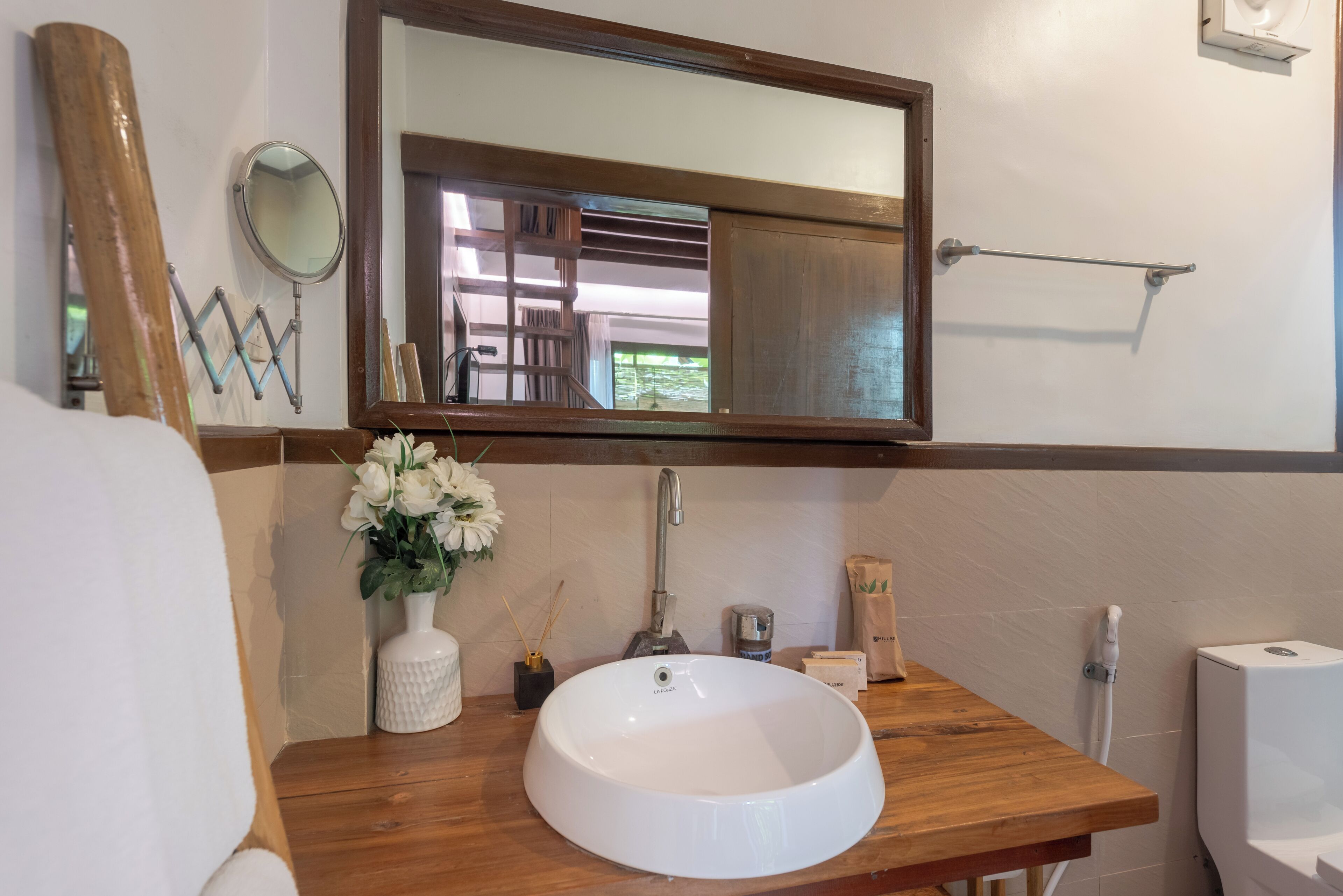 tropical family villa | bathroom | shower, rainfall showerhead, free toiletries, bidet