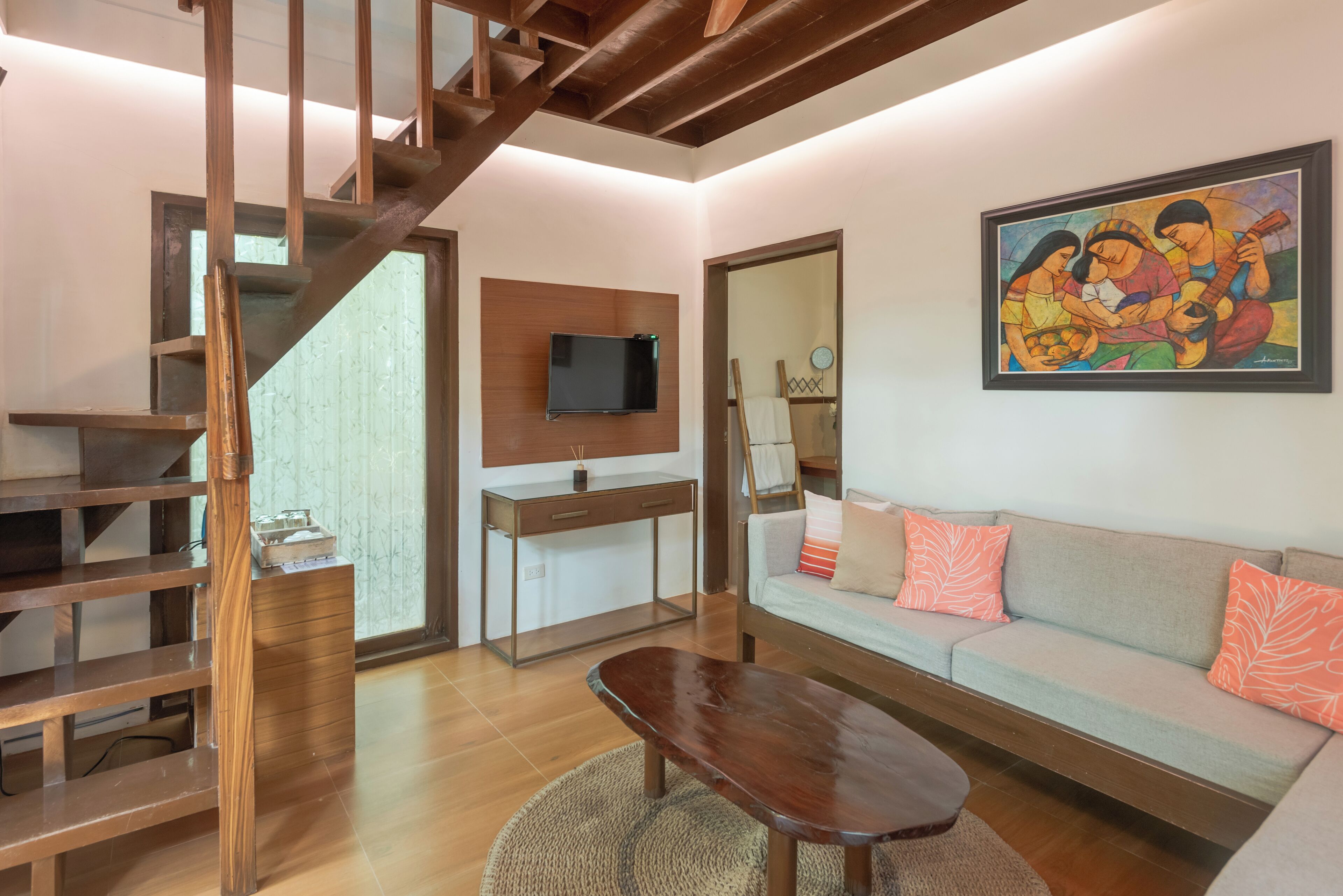 tropical family villa | living area | flat-screen tv
