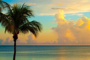 On the beach, sun loungers, beach towels