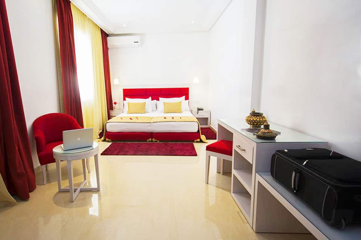 Ropa de cama de alta calidad y minibar 