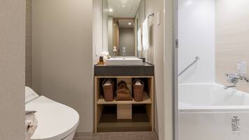 Free toiletries, hair dryer, slippers, electronic bidet
