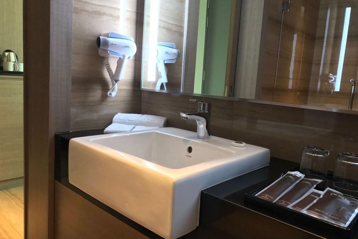 Bathroom | Free toiletries, hair dryer, slippers, electronic bidet