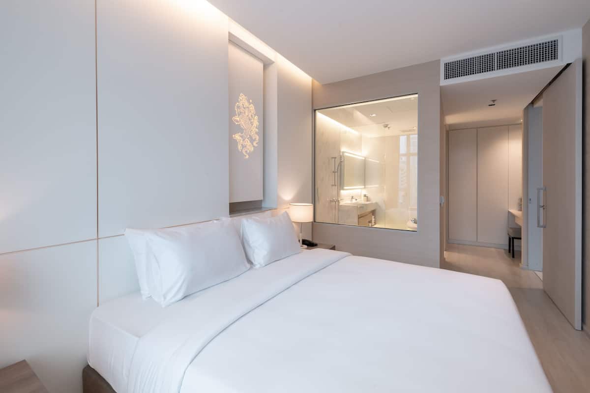 Junior Suite, 1 Bedroom | 1 soverom og sengetøy av topp kvalitet