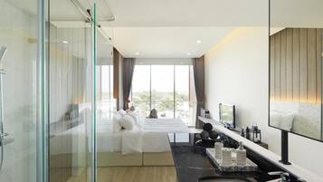 Douche, douche à « effet pluie », sèche-cheveux, serviettes fournies