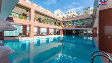 Outdoor pool, open 6:30 AM to 8:00 PM, sun loungers, lifeguards on site