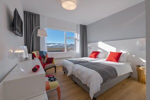 Premium bedding, down comforters, Select Comfort beds, minibar