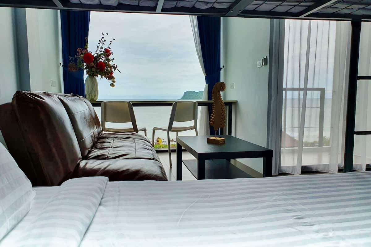 family duplex, sea view | living area | 32-inch smart tv with satellite channels, tv