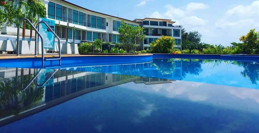 outdoor pool, open 7:00 am to 7:00 pm, pool umbrellas, pool loungers