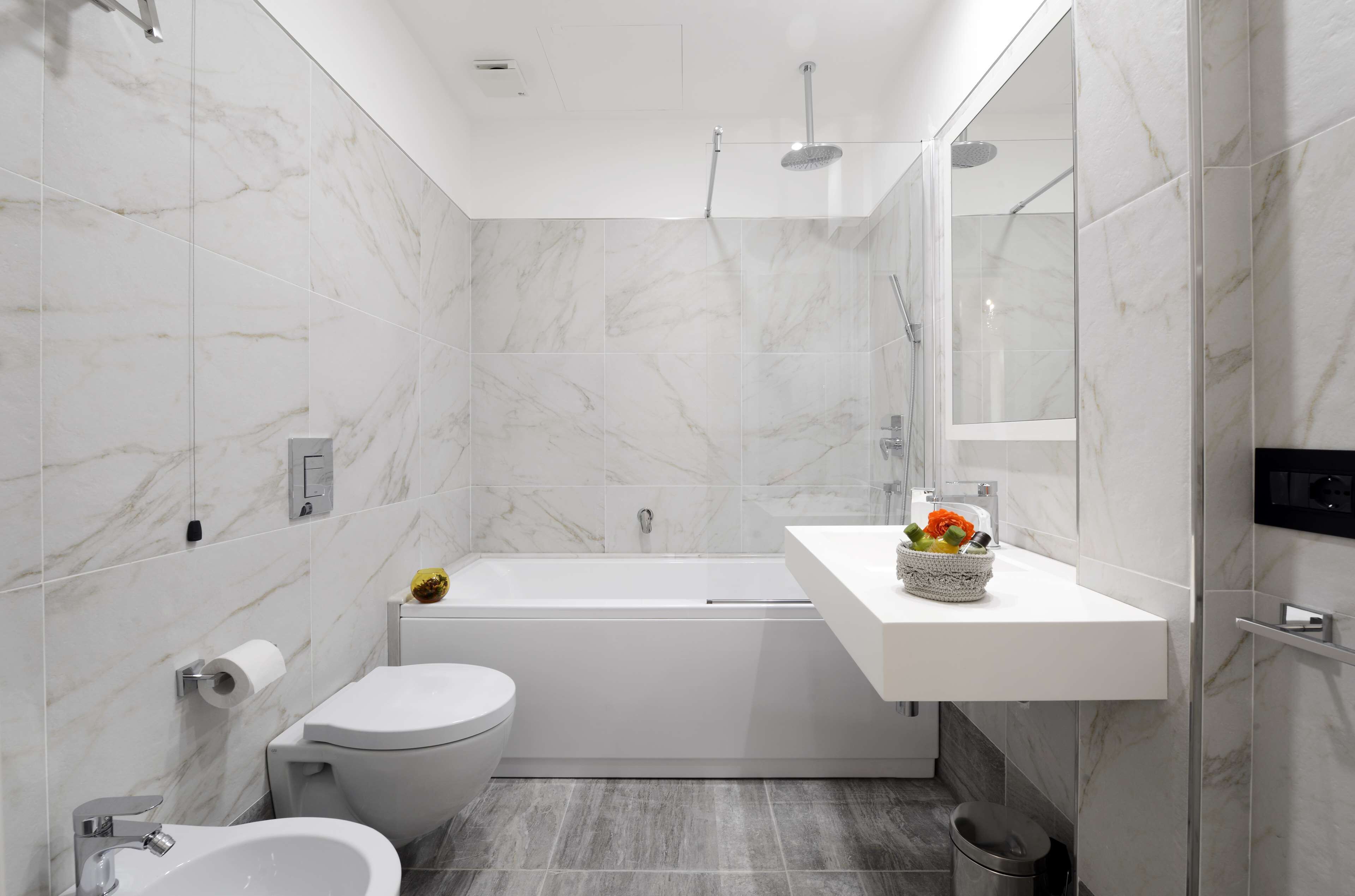 classic room, multiple beds, non smoking (converts to 2 twin beds) | bathroom | shower, free toiletries, hair dryer, slippers