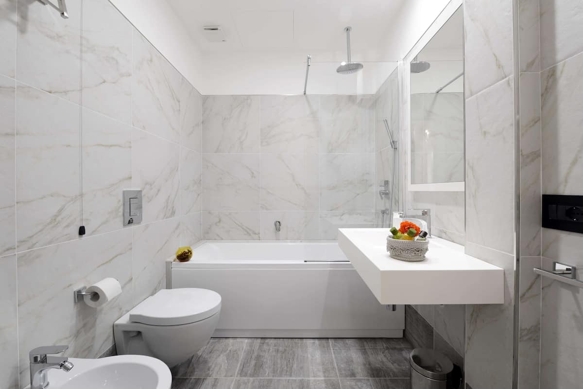 classic room, multiple beds, non smoking (converts to 2 twin beds) | bathroom | shower, free toiletries, hair dryer, slippers