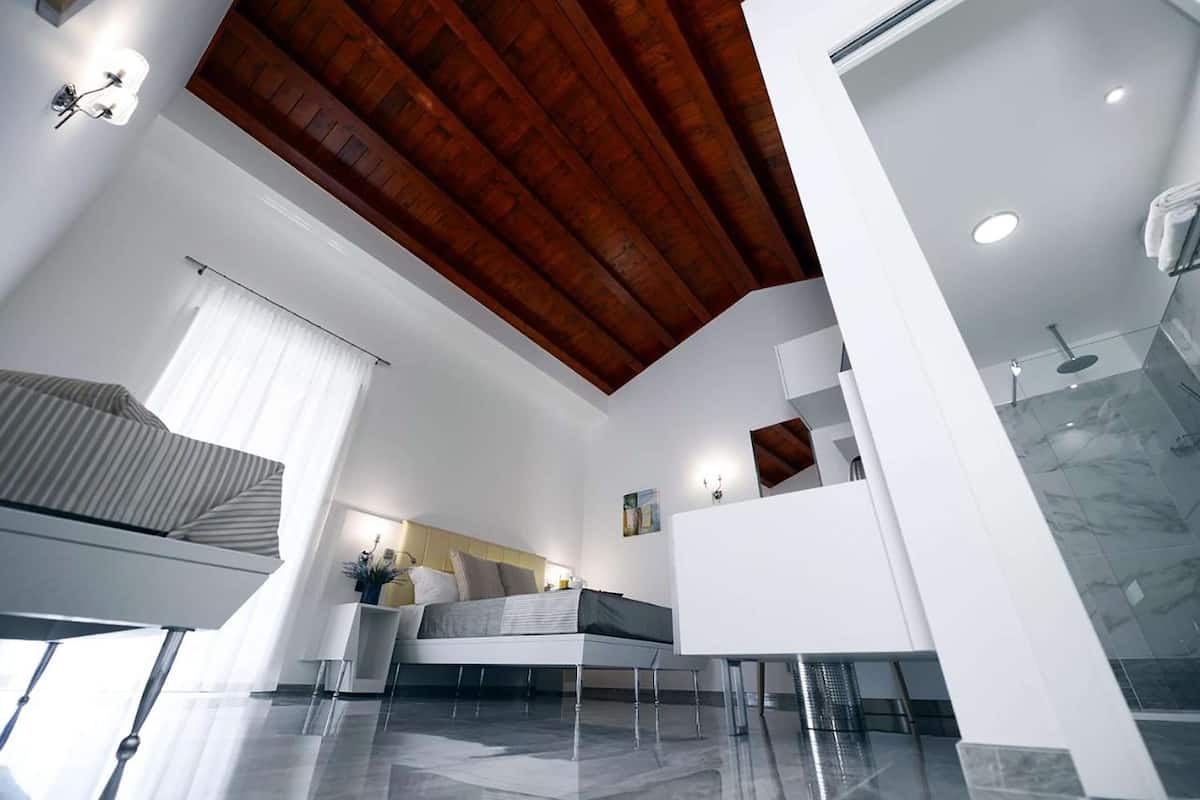 deluxe room, multiple beds, non smoking, balcony (converts to 2 twin beds) | minibar, in-room safe, desk, soundproofing