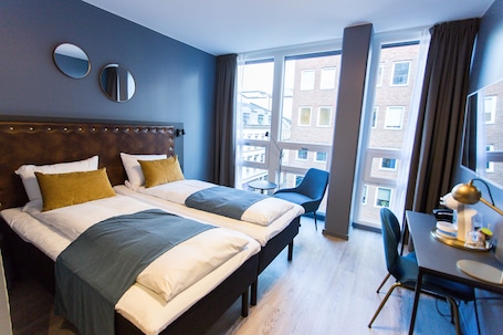 Cortinas blackout, insonorización, wifi gratis y ropa de cama