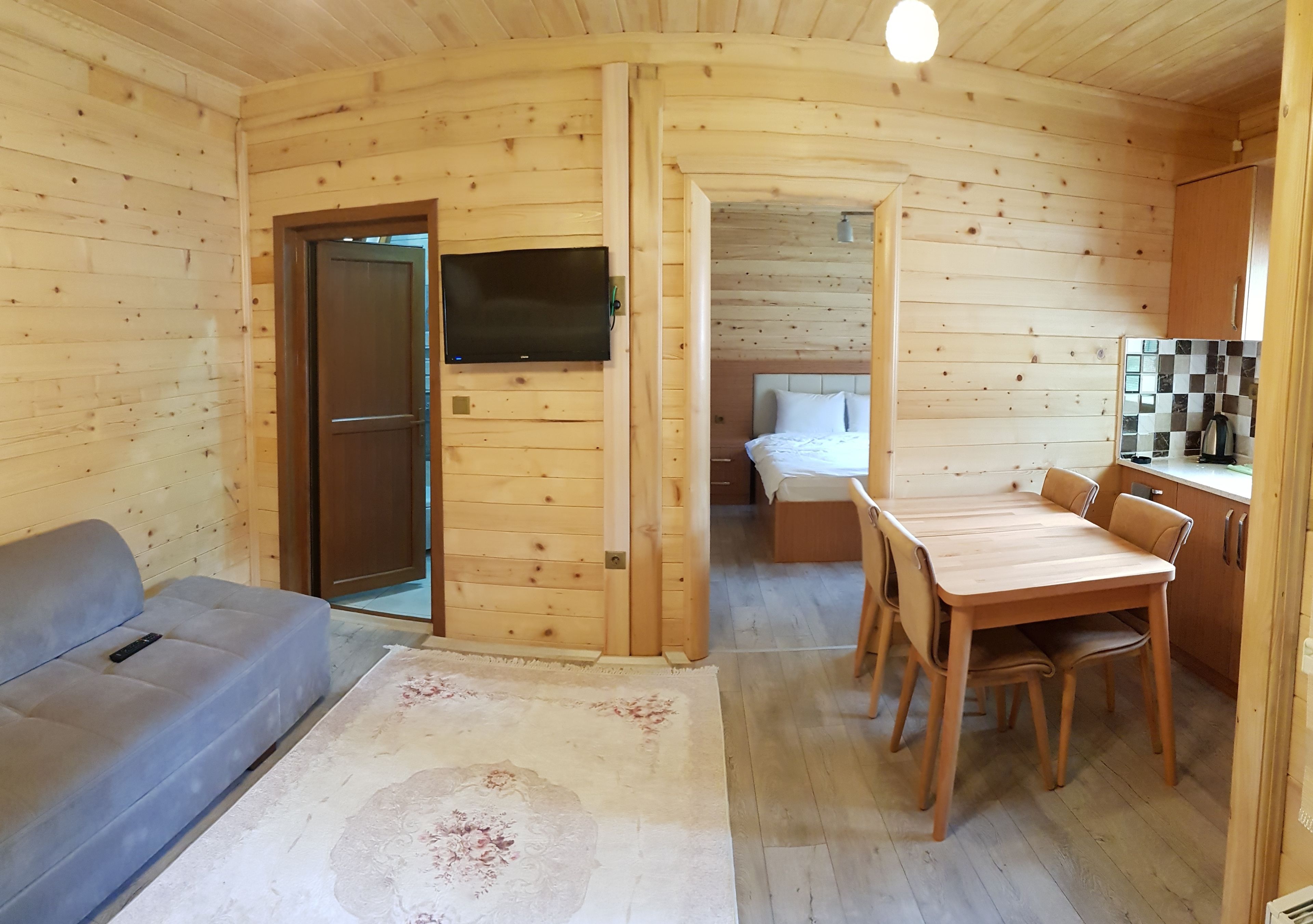 Junior-Apartment, 1 Schlafzimmer | Wohnbereich | LCD-Fernseher