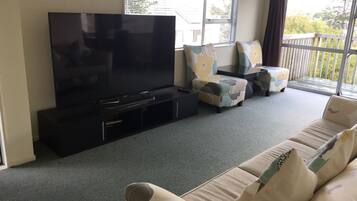 3 Bedroom House | Living area | Flat-screen TV