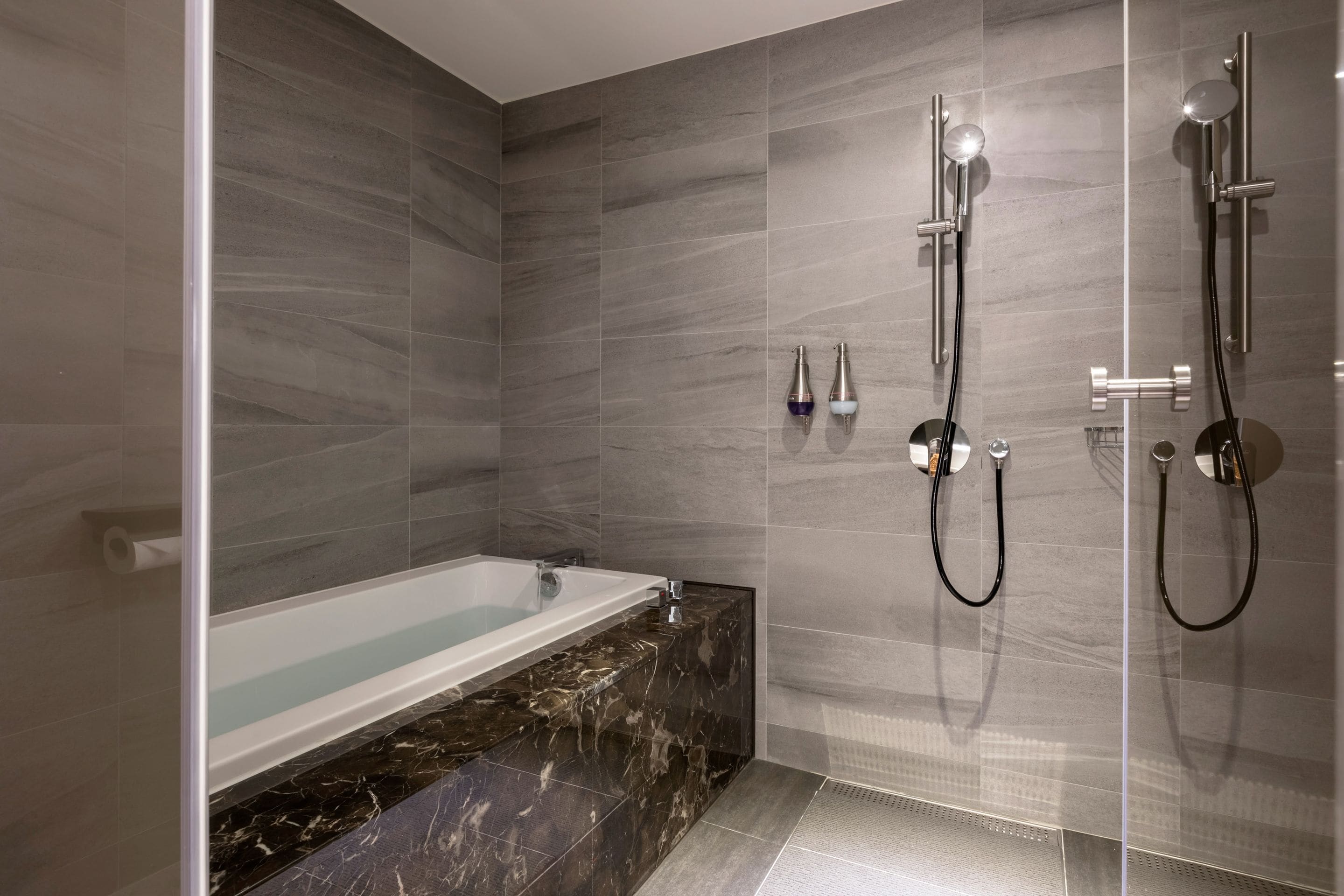 premier queen room | bathroom | hair dryer, slippers, electronic bidet, towels