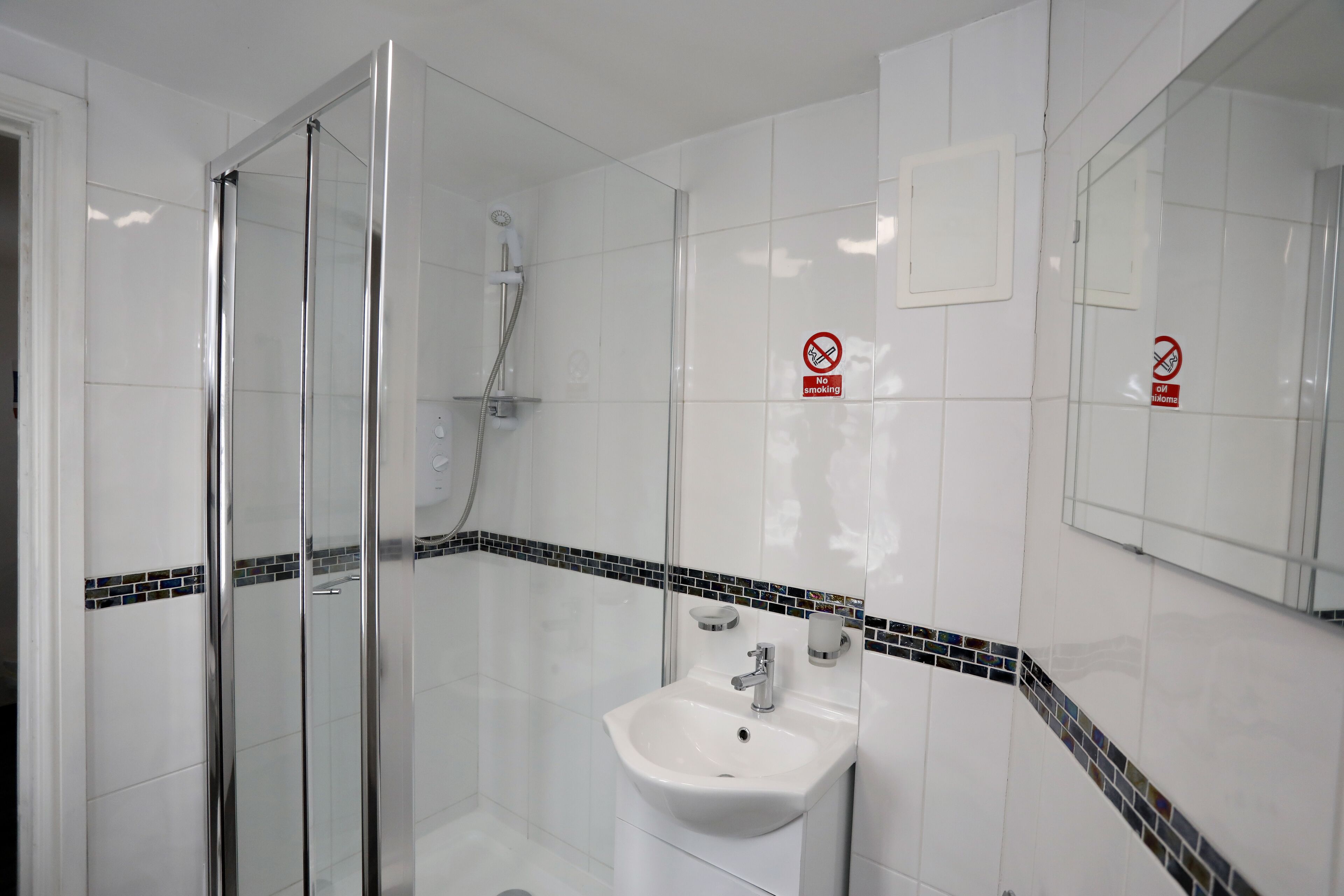 family room | bathroom | shower, free toiletries, hair dryer, towels