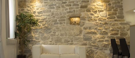 Apartment, 1 Bedroom, Accessible | Living room | Flat-screen TV