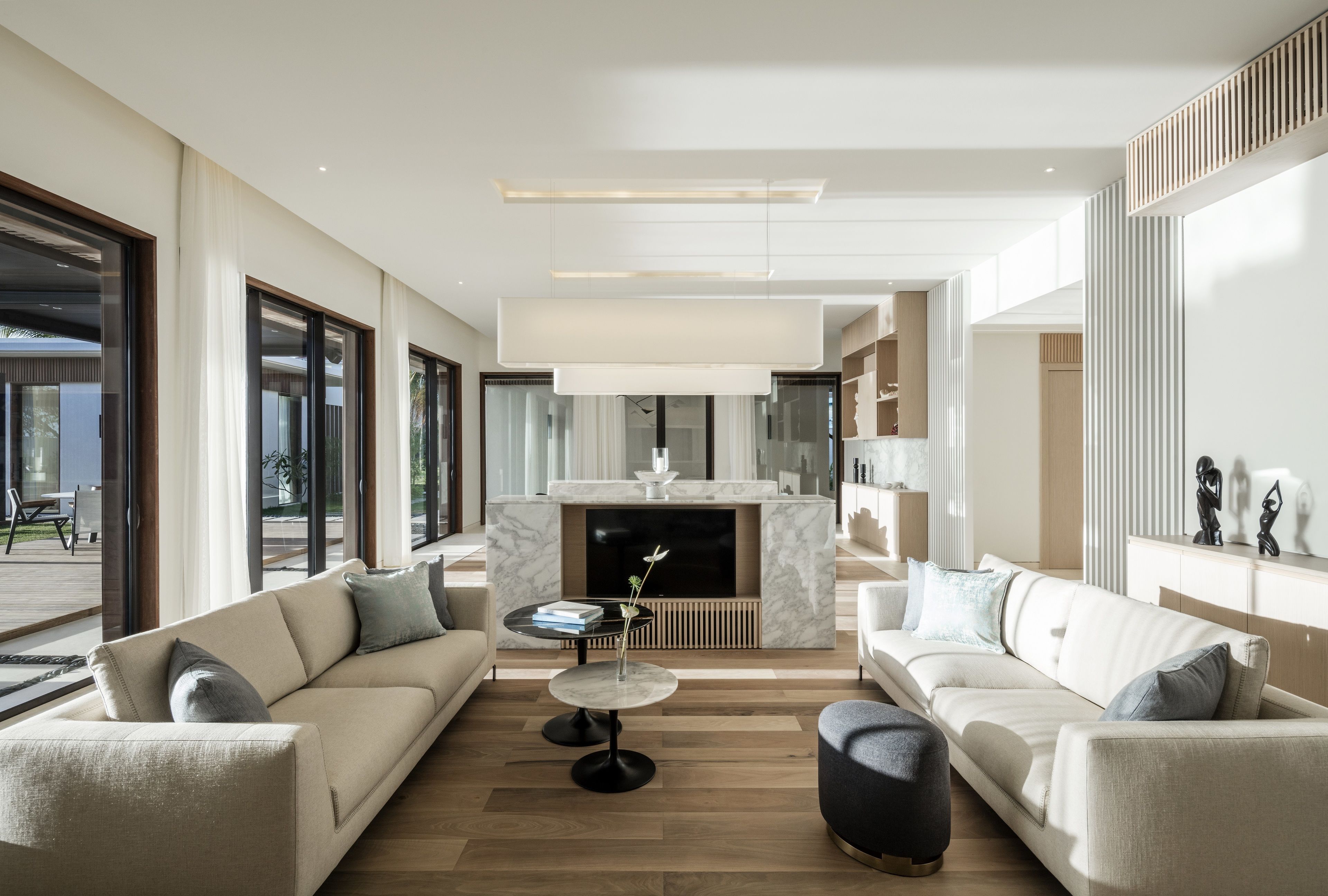 four bedroom beachfront pool villa | living area | 50-inch smart tv with cable channels, tv, netflix