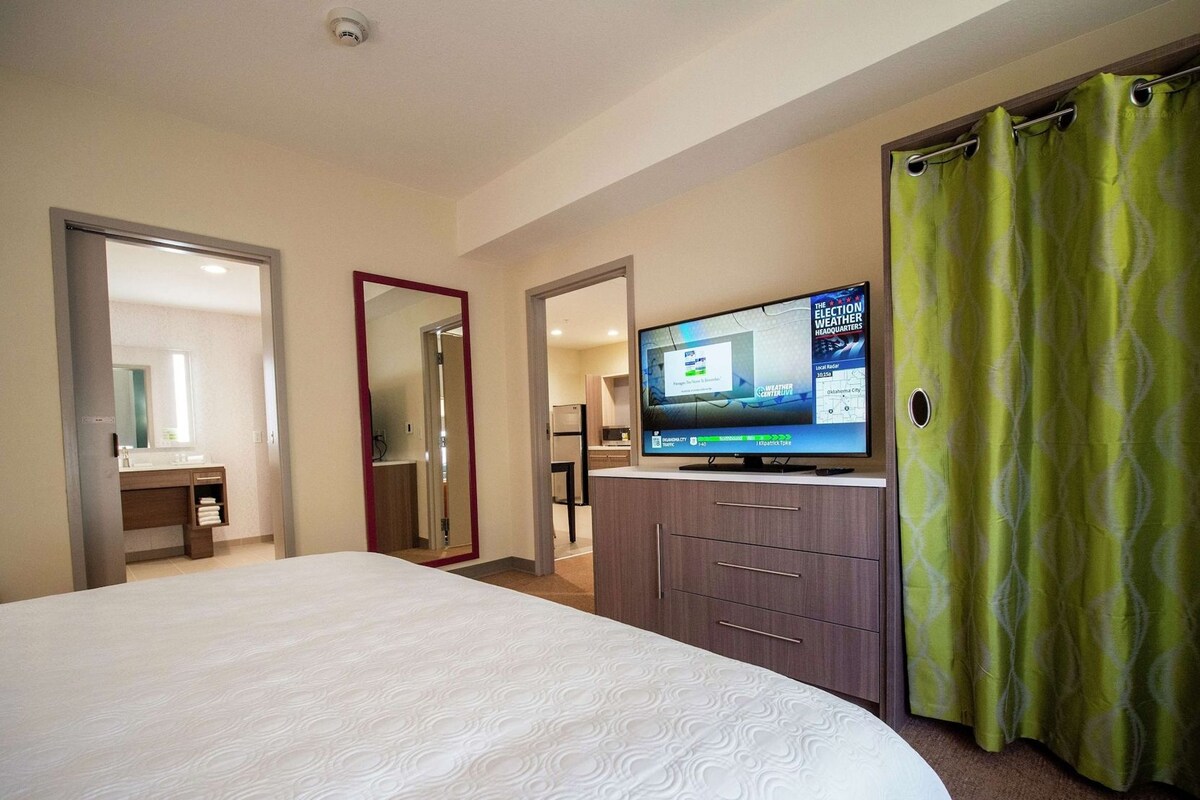Desk, laptop workspace, blackout curtains, iron/ironing board