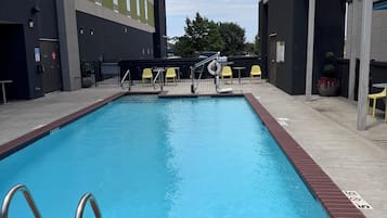 Seasonal outdoor pool, open 9:00 AM to 10:00 PM, sun loungers