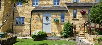 This contemporary cottage enjoys a peaceful location in an elevated position.