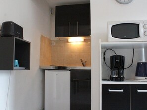 Fridge, microwave, coffee/tea maker, toaster