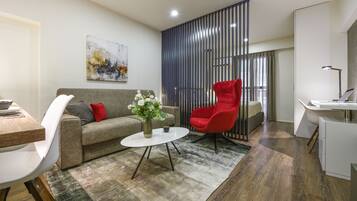 Apartment, City View | Living room | Flat-screen TV