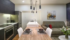 Apartment, City View | Private kitchen | Fridge, oven, stovetop, dishwasher - Olvios Design Suite (Thessaloniki)