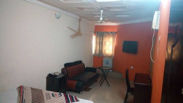 Desk, laptop workspace, free WiFi, bed sheets
