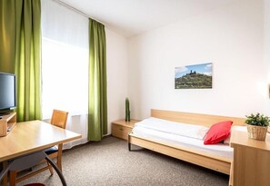 Desk, blackout curtains, rollaway beds, free WiFi