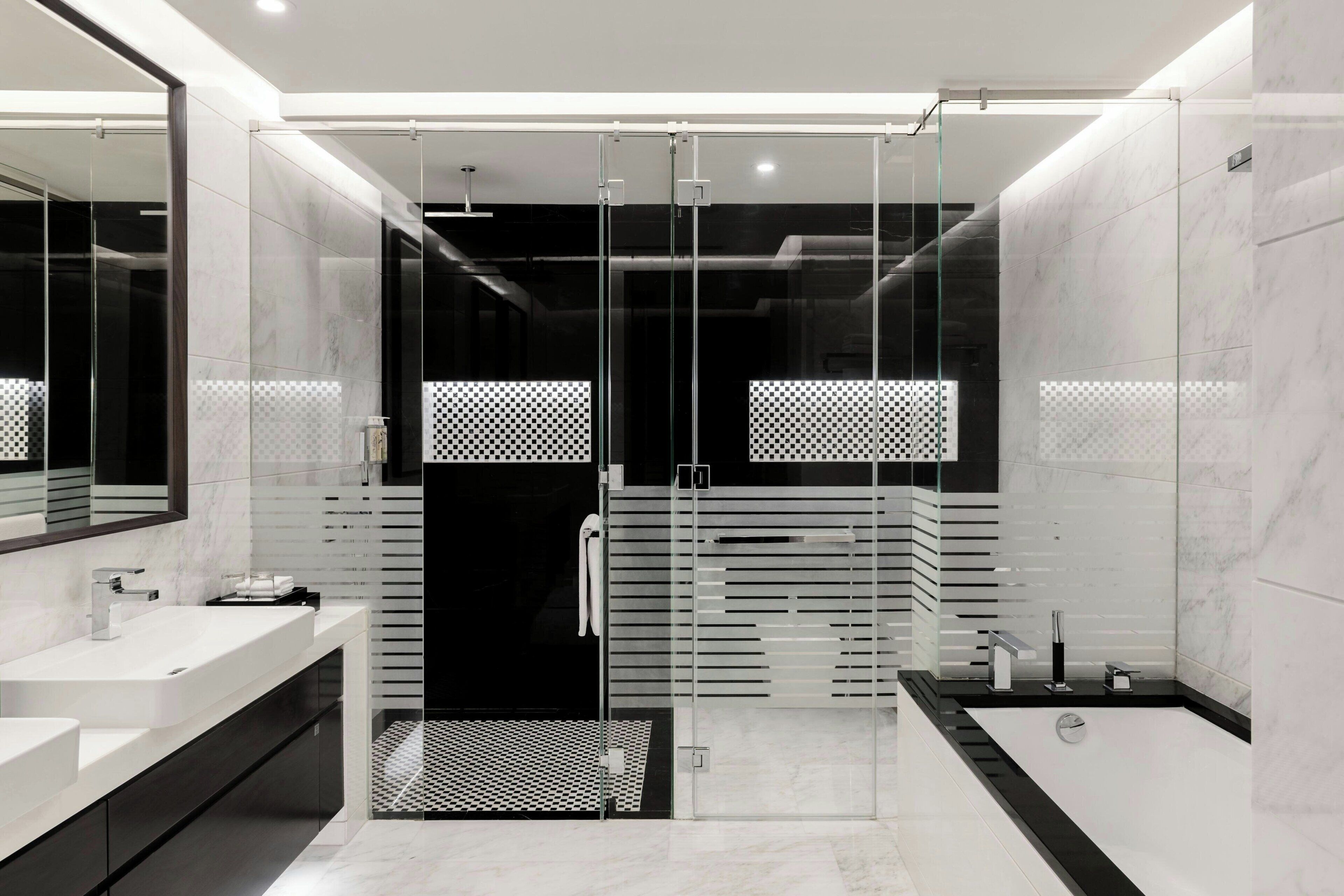 separate bathtub and shower, deep-soaking bathtub, rainfall showerhead
