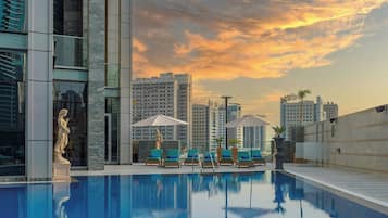 Outdoor pool, pool umbrellas, pool loungers