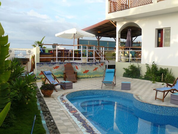 Outdoor pool, pool umbrellas, pool loungers