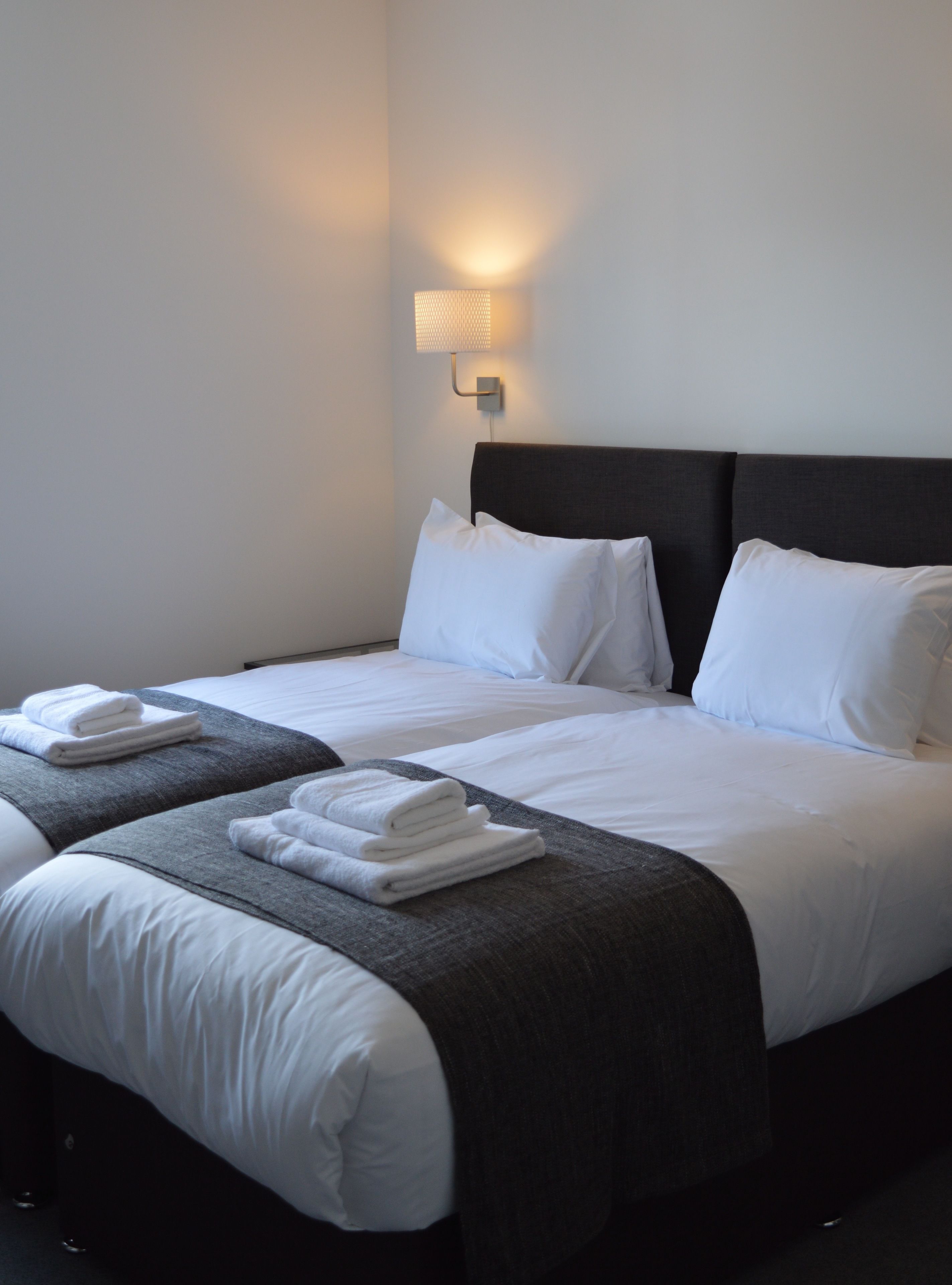 family room | premium bedding, iron/ironing board, free wifi, bed sheets