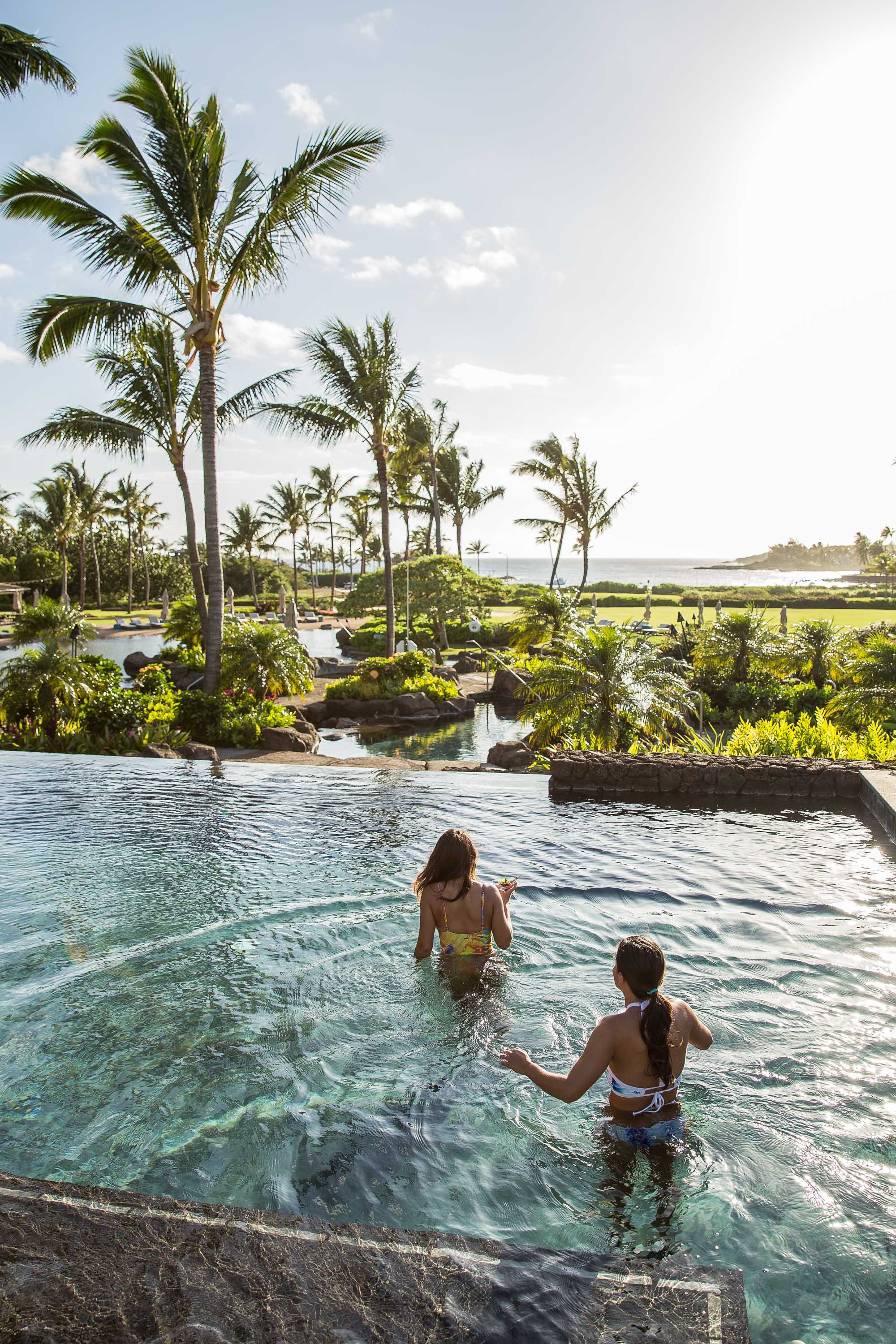 5 outdoor pools, open 7 AM to 8 PM, pool umbrellas, pool loungers