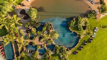 5 outdoor pools, open 7 AM to 8 PM, pool umbrellas, pool loungers