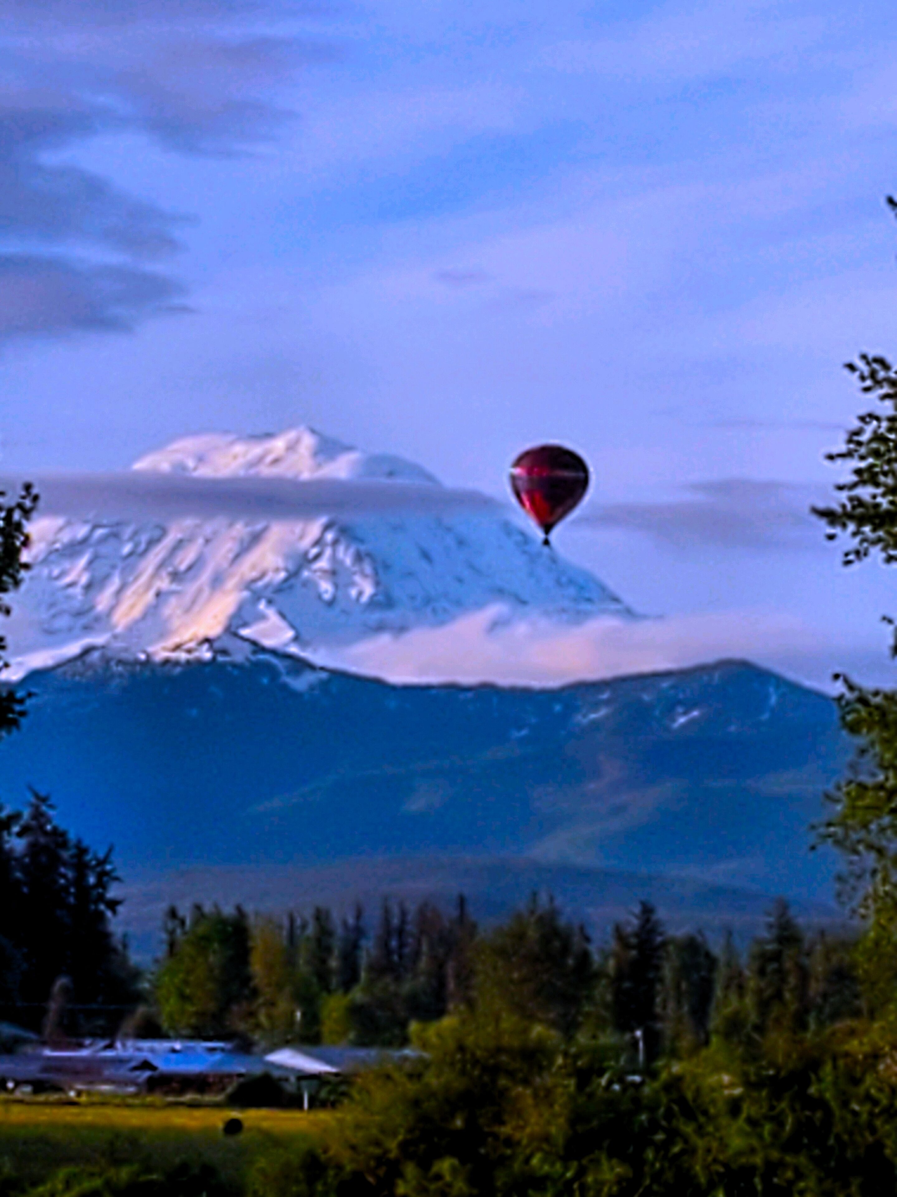Early Morning Balloon over Enumclaw Plateau, Mt Rainier in the background. 
