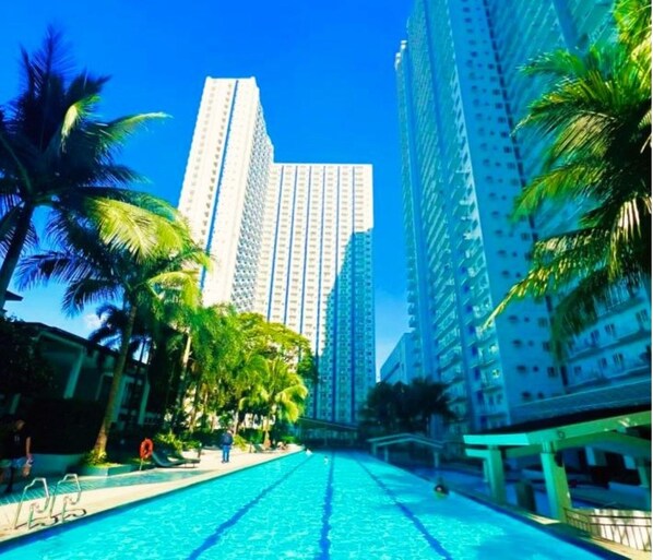 6 outdoor pools, open 10:00 AM to 10:00 PM, free cabanas, sun loungers - Grass Residence SM North MRT NLEX QC (Quezon City)