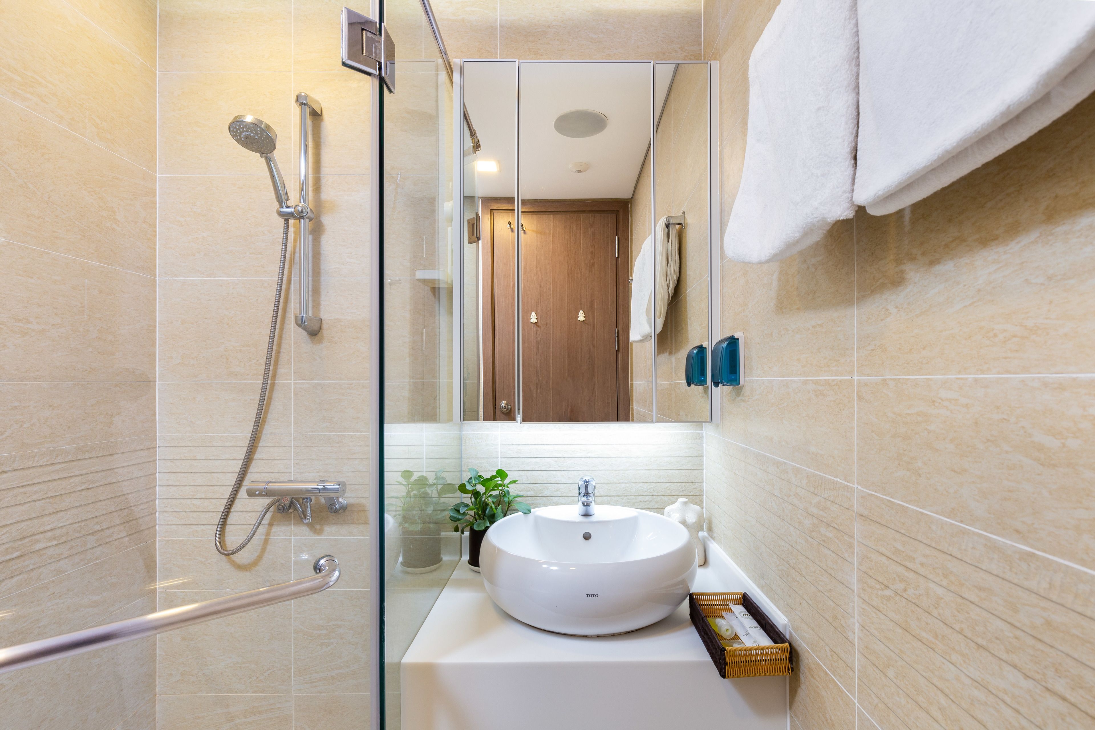 shower, rainfall showerhead, designer toiletries, hair dryer