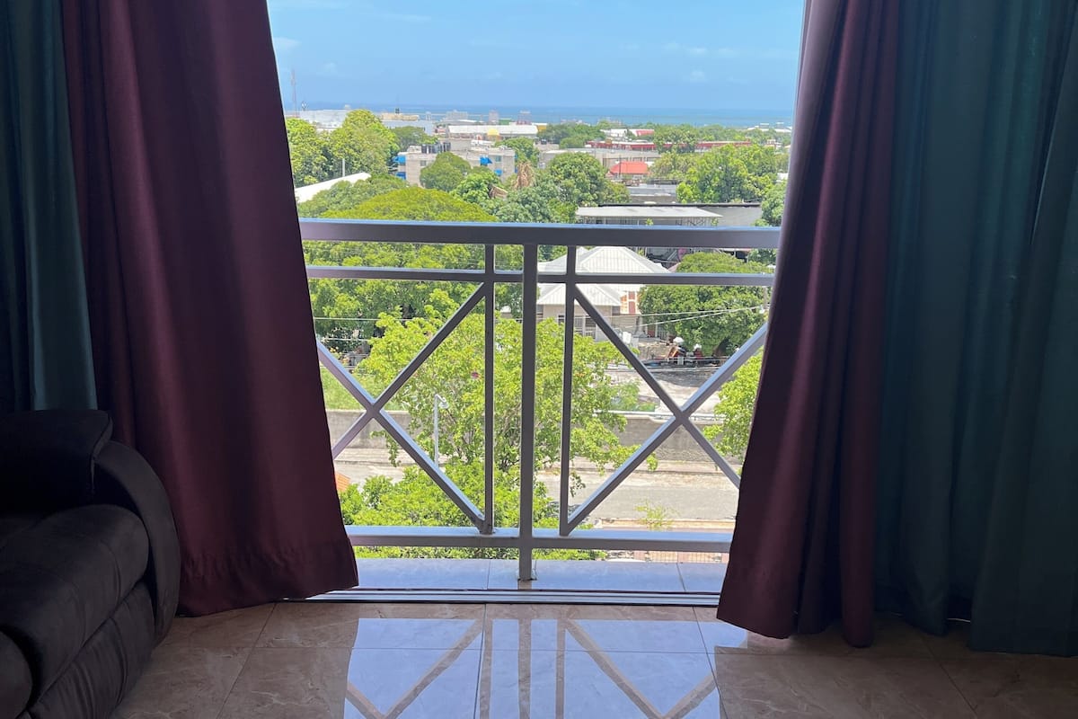 family apartment, multiple beds, non smoking | living area | tv