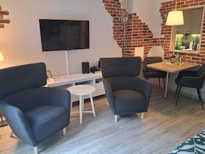 Télévision, livres, chaîne hi-fi