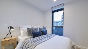 Apartemen Deluks, Beberapa Tempat Tidur | 3 kamar tidur, seprai premium, meja kerja, dan setrika/meja setrika
