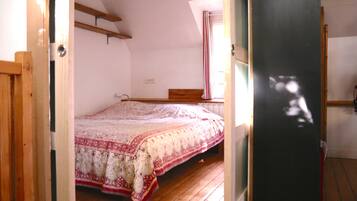 1 bedroom, desk, iron/ironing board, travel cot