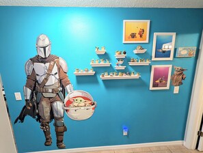 Interior - Stay in a Star Wars-themed vacation home in Emerald Island Resort near Disney. This family-friendly Kissimmee getaway features a private pool and spa, game room, smart-lock check-in, and room for your group to relax after the parks. (Kissimmee)