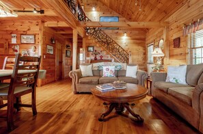 Téléviseur, foyer, lecteur de DVD, livres