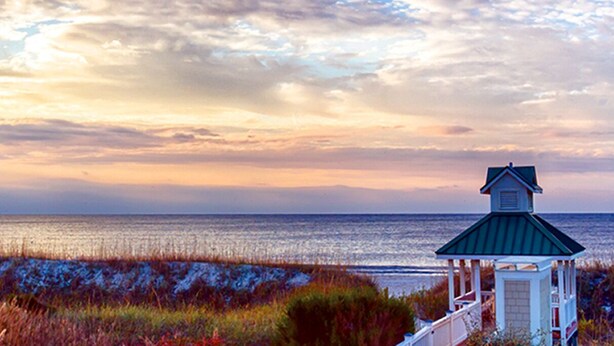 A beach gazebo with a green roof overlooking the ocean. - Spacious Upscale Condo,  Monthly Rates Available October- April,  Call Owner (Southport)
