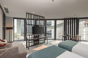 Executive Suite Twin Room | Minibar, in-room safe, desk, laptop workspace - JHL Solitaire Gading Serpong (Gading Serpong)