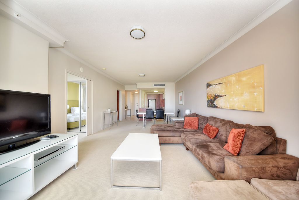 deluxe apartment, 2 bedrooms, 2 bathrooms | living area | dvd player