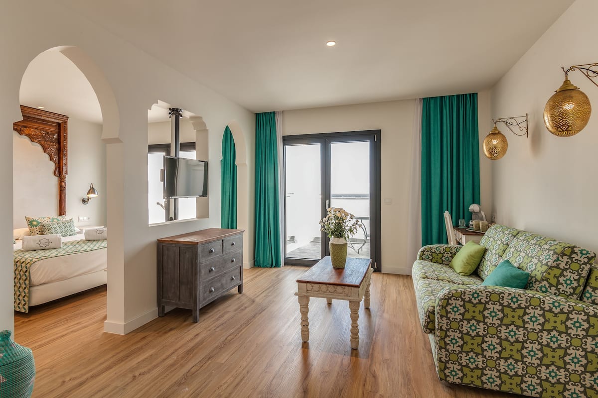 junior suite, sea view | 1 bedroom, minibar, in-room safe, desk